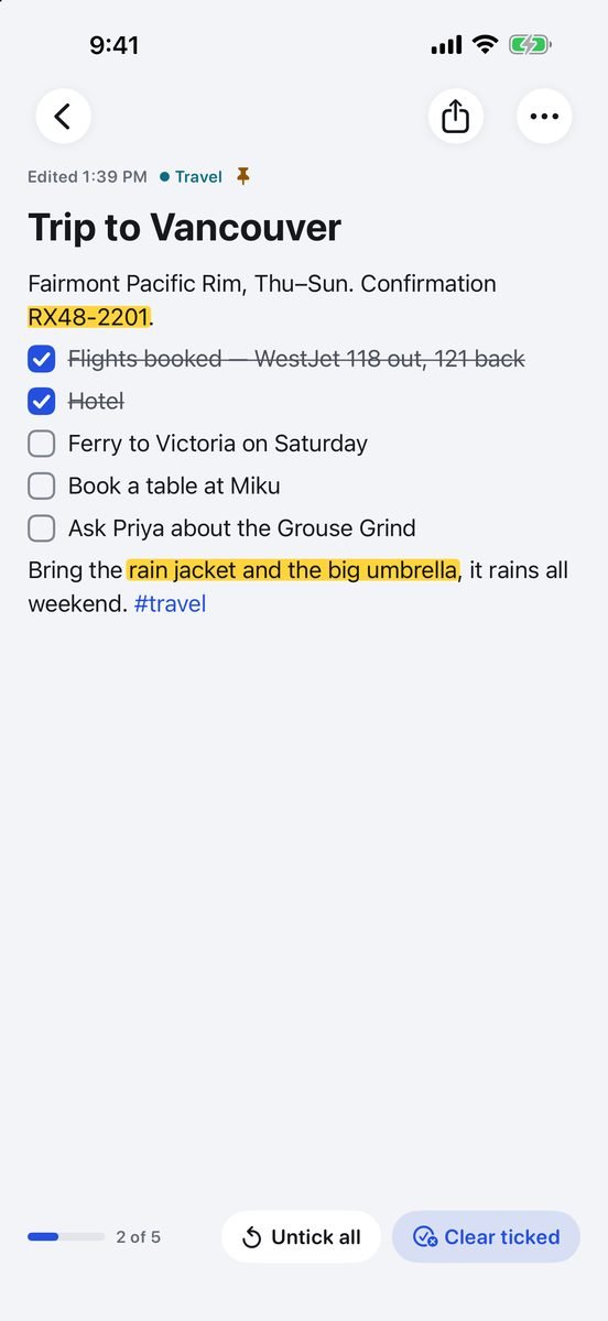 A note about a trip to Vancouver: two phrases marked with a yellow highlighter, two ticked checklist items struck through and three still to do.
